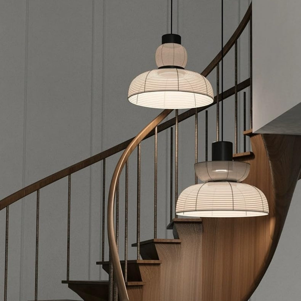 Set of zen inspired paper globe pendant lights featuring diverse sculptural shapes