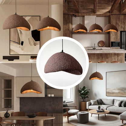 Zen-inspired organic rock-shaped hanging light with warm interior glow