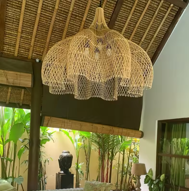 Minimalist Wabi-Sabi bamboo wave light fixture pairing beautifully with raw natural stones and earthy decorative ceramics.