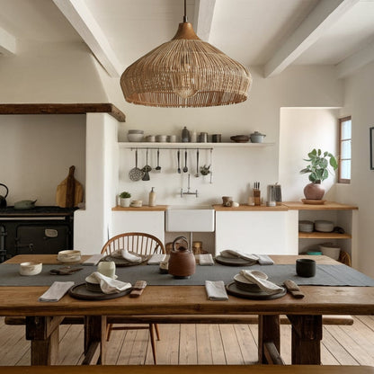 Beautiful rattan and wood lamp hanging over a modern kitchen island for accent lighting.