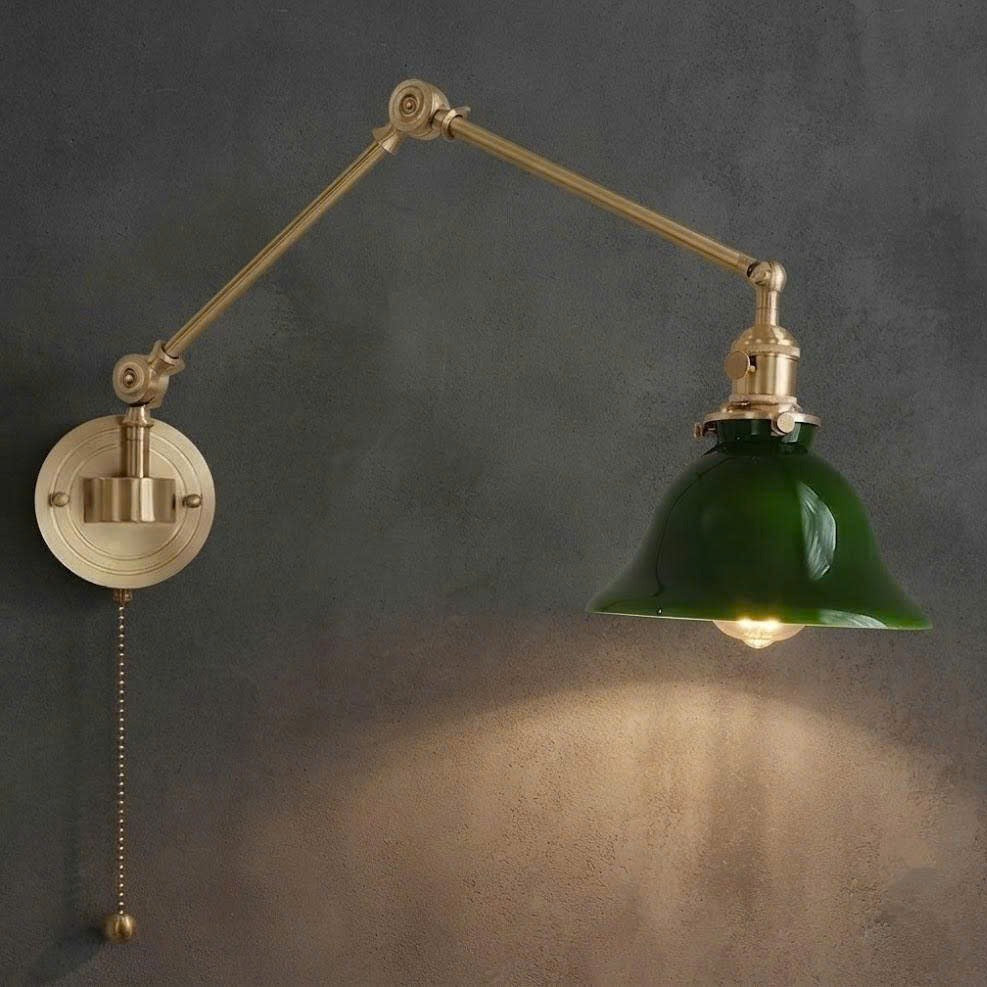 Brass and ceramic material lamp featuring an articulated swing arm for luxurious, warm, and inviting architectural lighting.