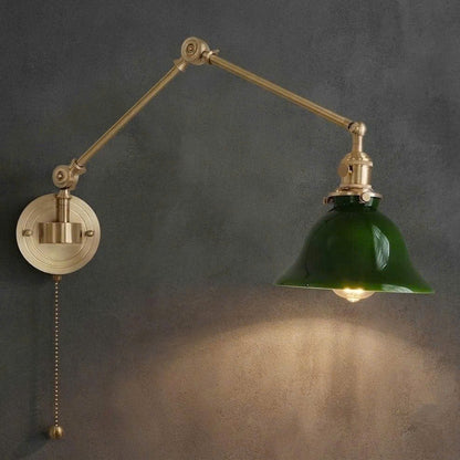 Brass and ceramic material lamp featuring an articulated swing arm for luxurious, warm, and inviting architectural lighting.