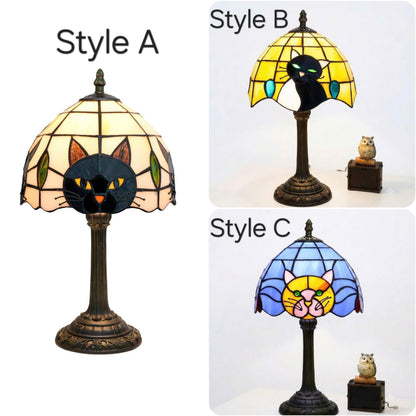 Cozy home style stained glass table lamp with an endearing cat face pattern to brighten up accent tables.