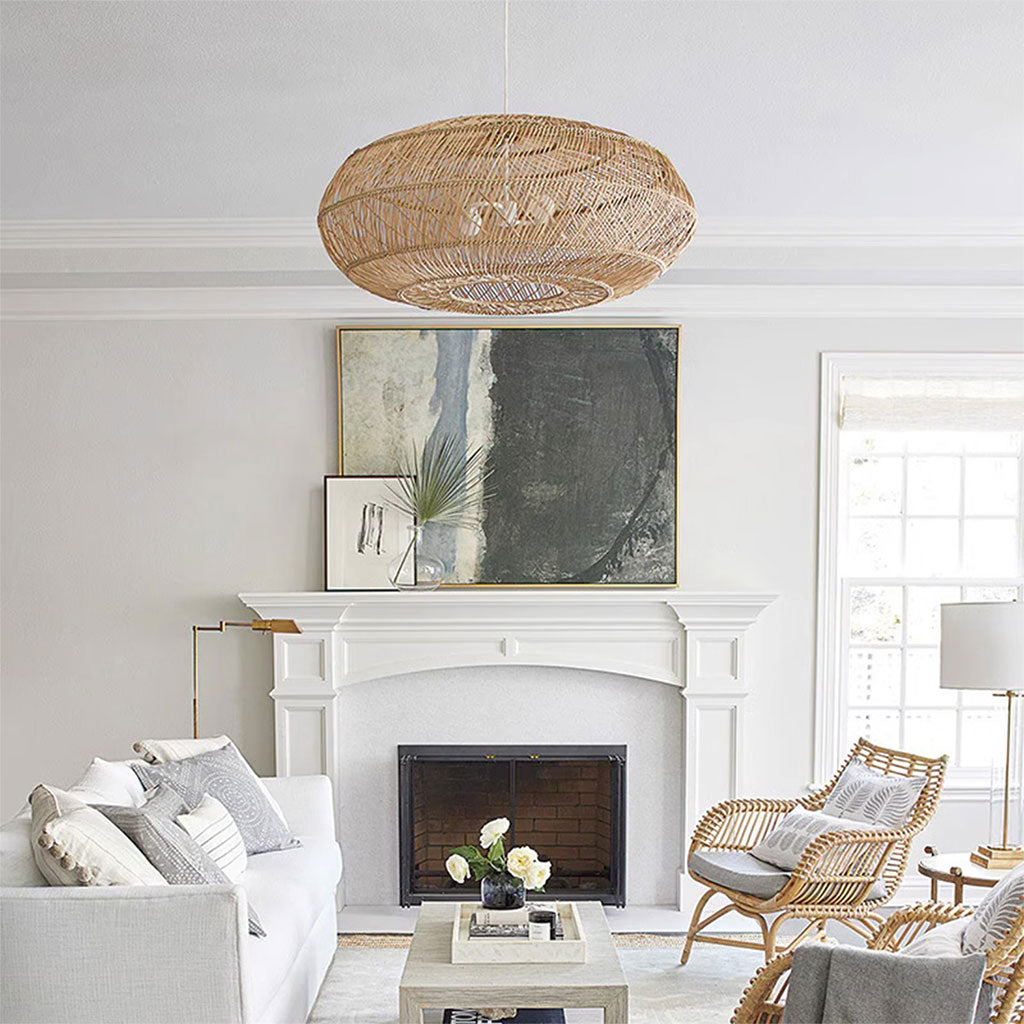Decorative rattan pendant lights installed above a dining room setting.
