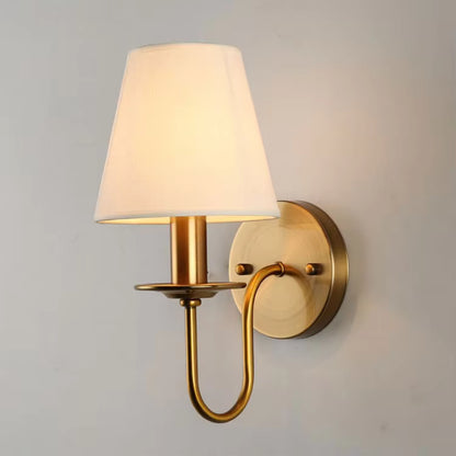 Entryway light style iron and fabric wall drop light creating a warm, inviting first impression for guests.