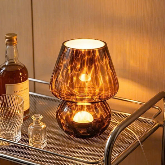 Charming glass mushroom table lamp featuring a coffee dotted pattern, providing warm ambient lighting for living rooms.