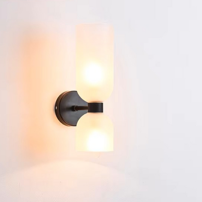 Scandinavian handmade copper and glass hanging wall lamp built with sustainable resources along a staircase.