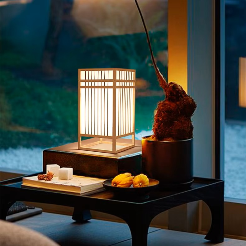 Minimalist wooden shoji table lamp serving as a serene, ambient accent light for living room tea tables and coffee bars.