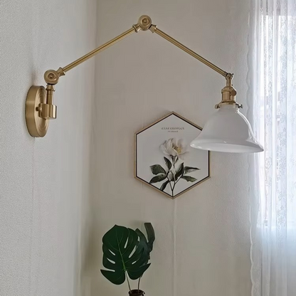 Living room lighting brass swing-arm wall sconce designed to provide adjustable warm accent illumination for upscale seating areas.