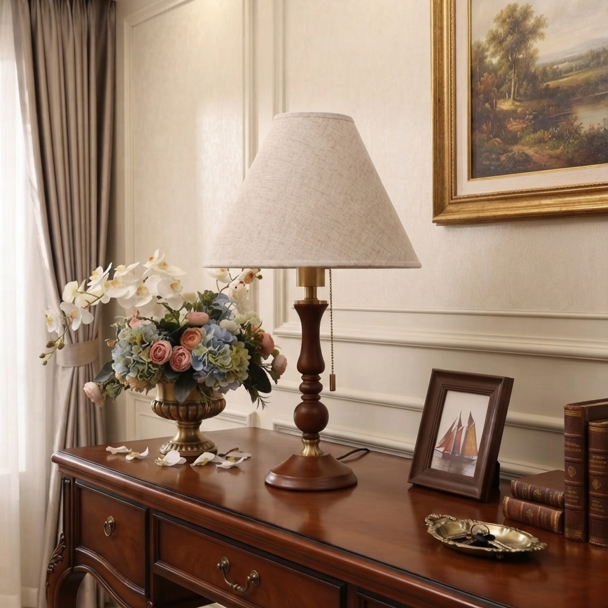 Sophisticated neoclassic wood table lamp serving as a grand statement lighting piece for entryway and foyer consoles.