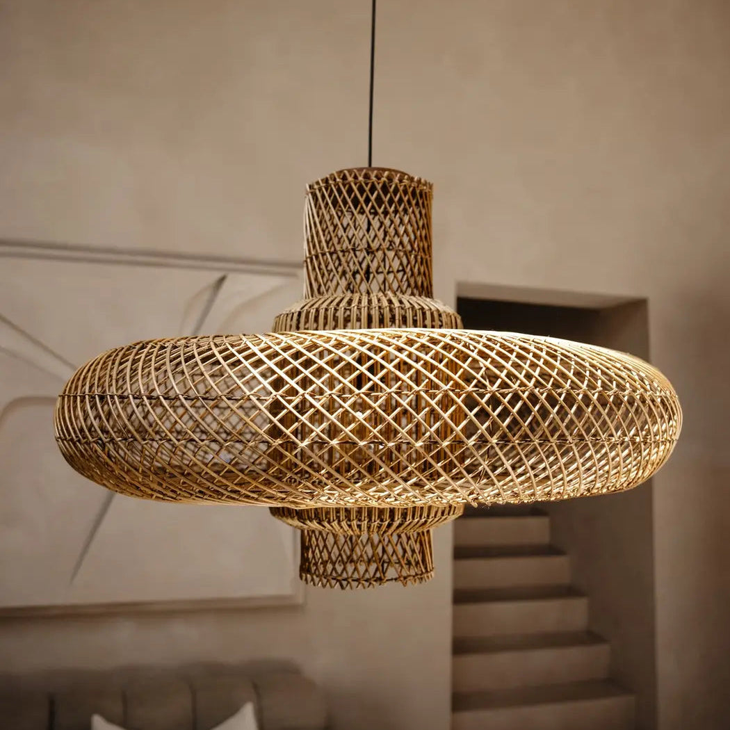 Sustainable organic woven wicker hanging lantern featuring natural bamboo textures.