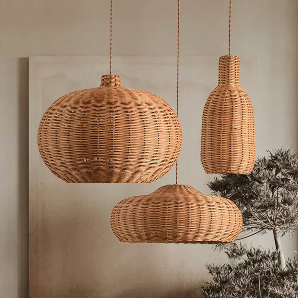 Stylish rattan ceiling lights installed above a wooden dining room table