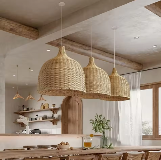 Rattan pendant light installed in a cozy, minimalist living room setting.