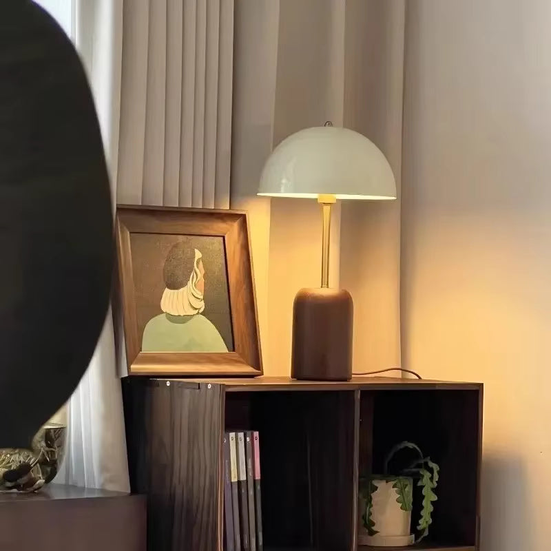 Solid Wood Cylinder Base with Brass Stem and Cream Metal Shade featuring Downward Glow