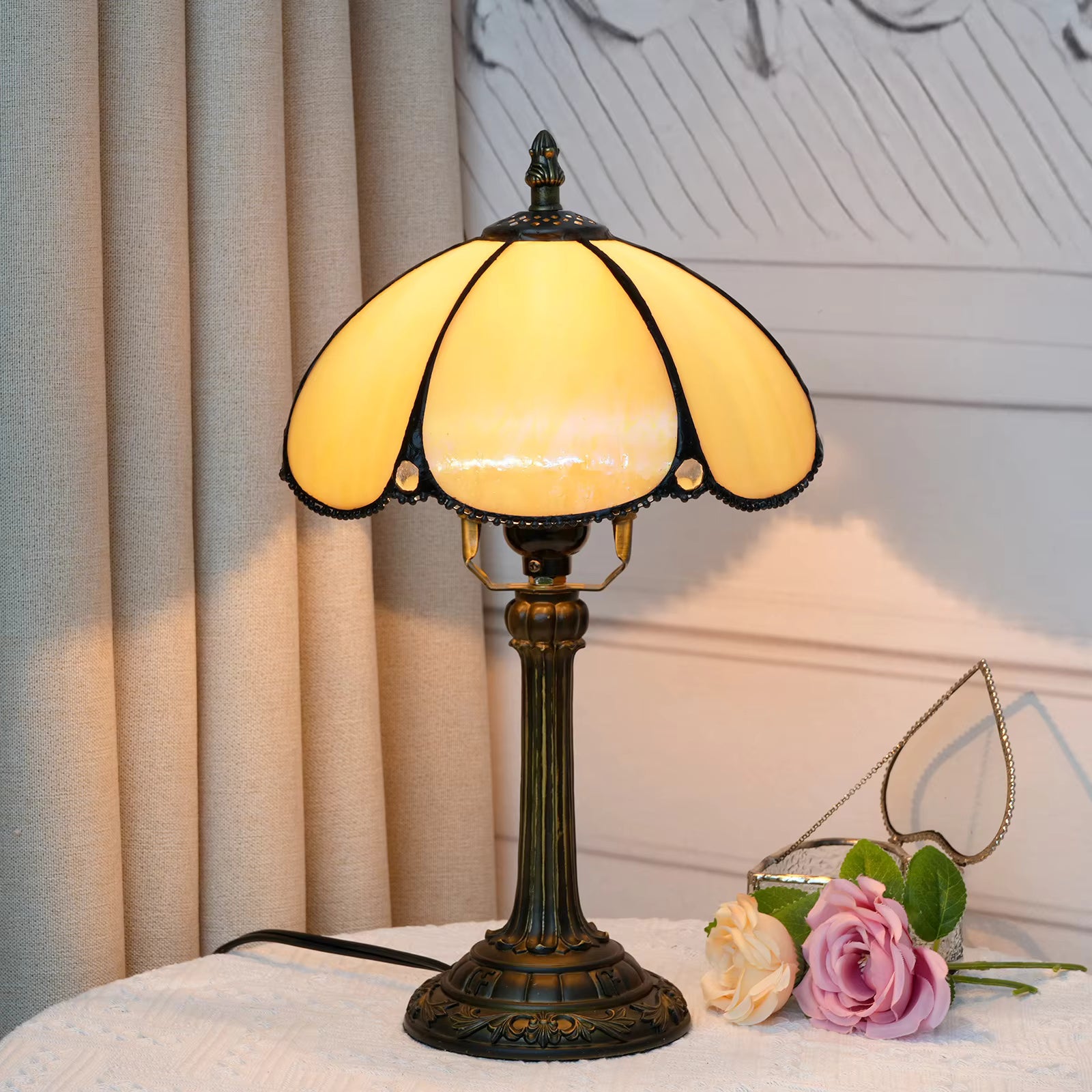 Bohemian style stained glass amber desk lamp with soft yellow panels, adding vintage art-glass decor to study rooms.
