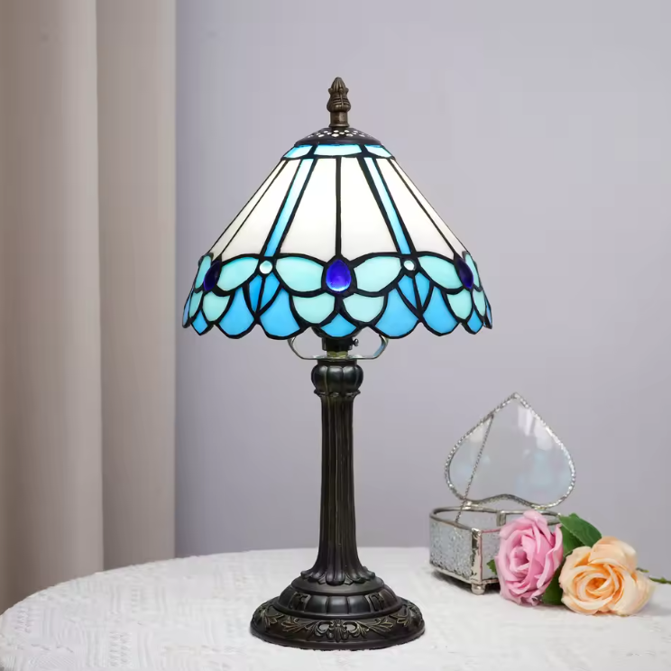 Vintage retro style stained glass lamp with a classic grape harvest pattern, serving as a statement piece for hallway console tables.
