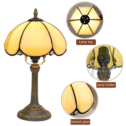 Vintage retro style stained glass lamp with a classic scalloped shade, serving as a statement piece for hallway console tables.