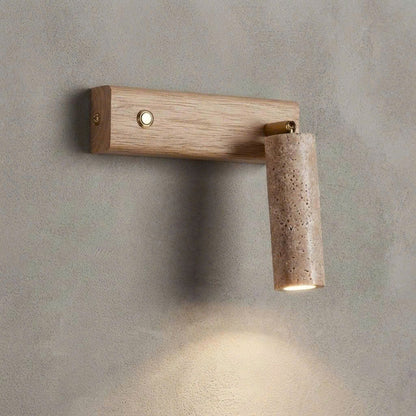 Handmade eco-friendly wood and stone wall lamp providing safe, health-conscious ambient illumination in a bedroom.