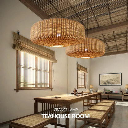 Soft ambient lighting from oversized rattan dome shades hanging in a cottage kitchen.